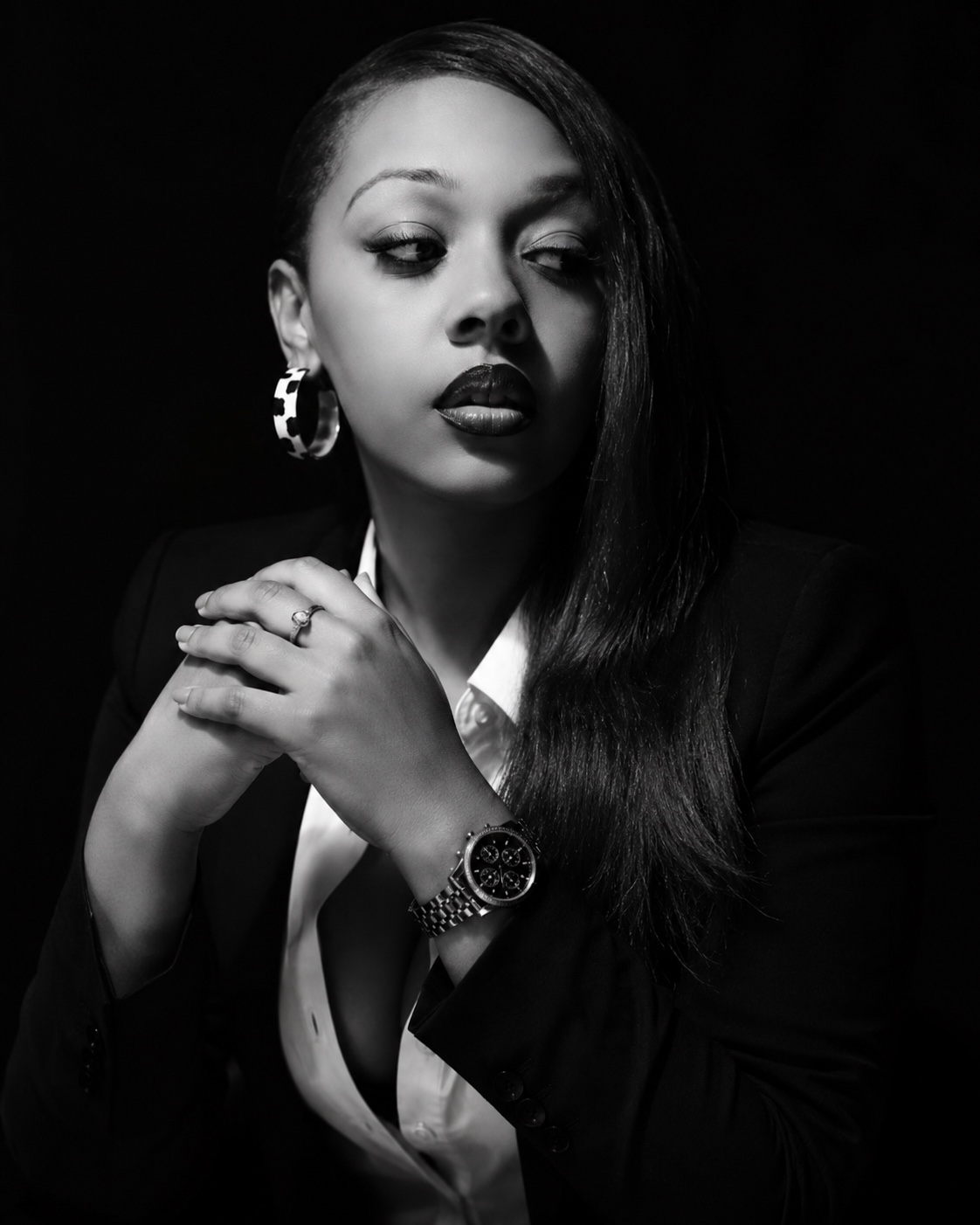 Black-and-white editorial portrait of DaVonna May